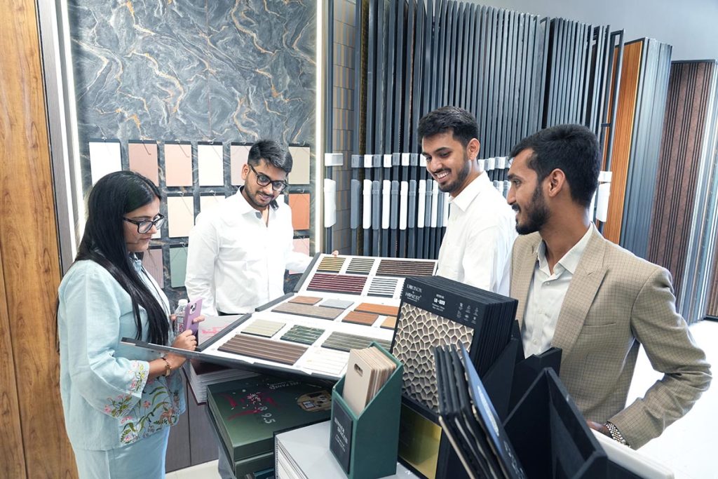 Interior designers browsing decorative surface options