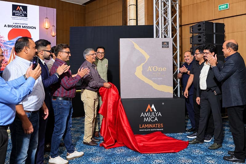 Amulya Mica unveiling the A’One laminate collection at a launch event in Delhi with channel partners and industry guests.